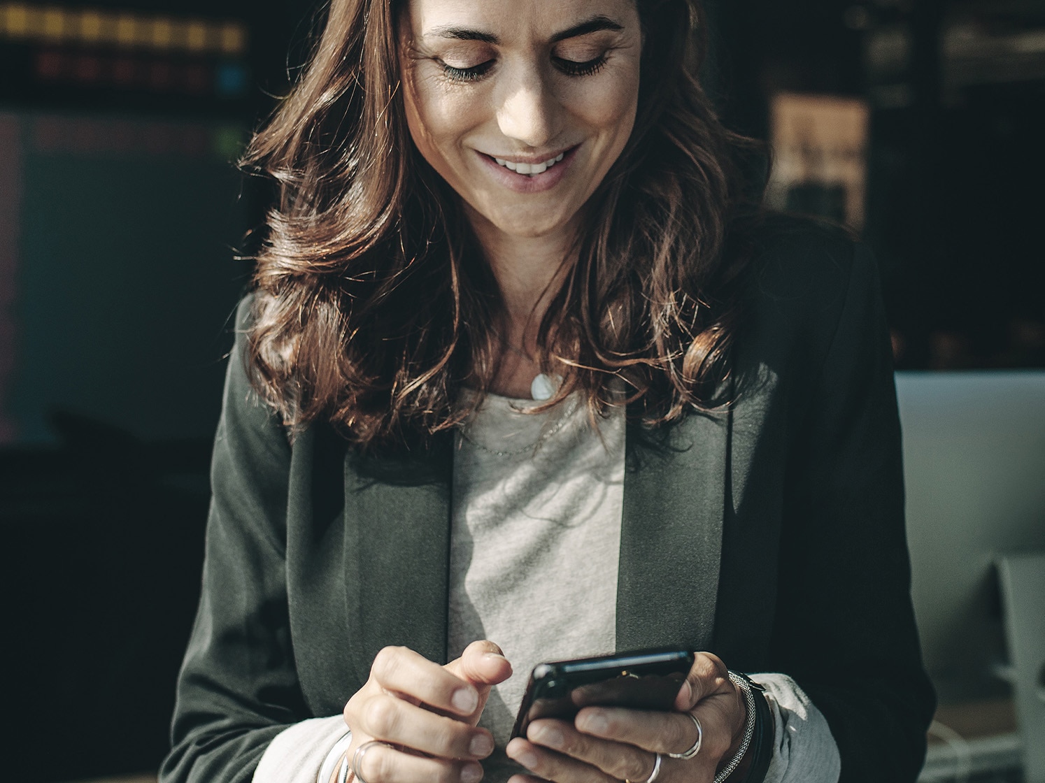 Person using MyDS app on smartphone